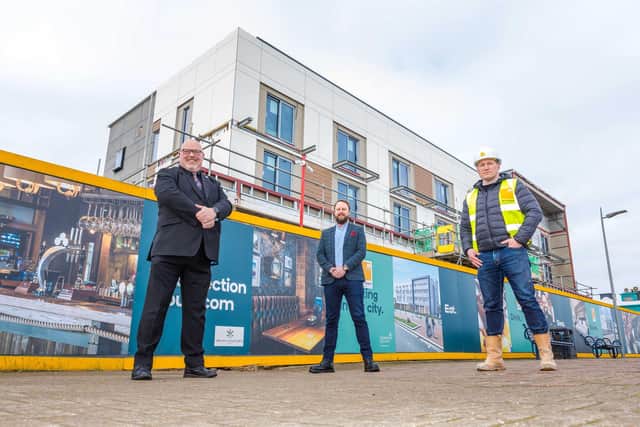 The glazing work has been completed at the Seaburn Inn development on Seaburn seafront. L/R Cllr Graeme Miller, Dan Evans (The Inn Collection Group) and Mark Doyle (Metnor)