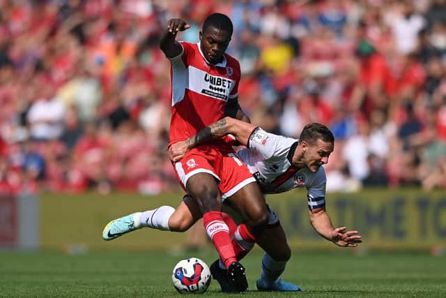 MIDDLESBROUGH, ENGLAND - AUGUST 14: Middlesbrough player Anfernee Dijksteel challenges Billy Sharp of Sheffield United during the Sky Bet Championship between Middlesbrough and Sheffield United at Riverside Stadium on August 14, 2022 in Middlesbrough, England. (Photo by Stu Forster/Getty Images)