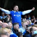 An Ipswich Town supporter shows his support during the Sky Bet League One match between Ipswich Town and Shrewsbury Town at Portman Road.