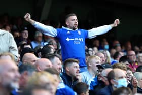An Ipswich Town supporter shows his support during the Sky Bet League One match between Ipswich Town and Shrewsbury Town at Portman Road.