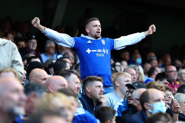 An Ipswich Town supporter shows his support during the Sky Bet League One match between Ipswich Town and Shrewsbury Town at Portman Road.