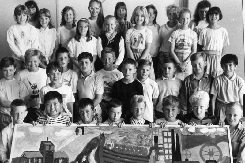 Pupils from Simonside Junior Mixed Infant School with their end of term artwork in July 1989.