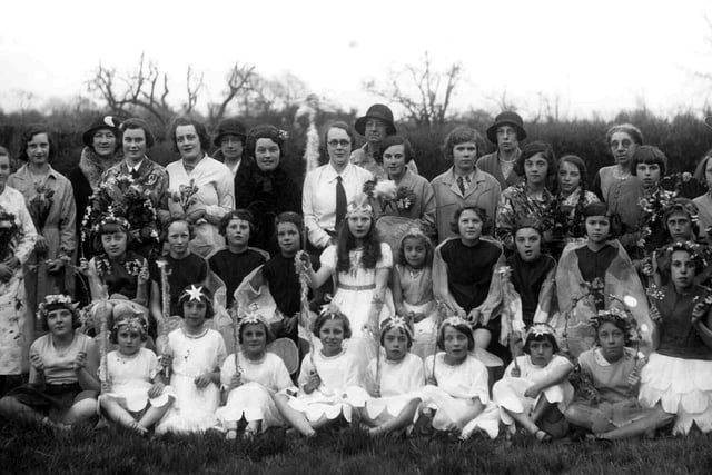 May Queen 1931
Sent in by Mrs Joyce Clancy nee Brooks of Havant we see the May Queen at Bedhampton  School, Bedhampton near Havant. Joyce is third from the right front row, Taken sometime in the early thirties the May Queen in the centre with long hair is Doris Gregory and her maid is Elsie Allan. The school is now the Bedhampton Arts Centre.