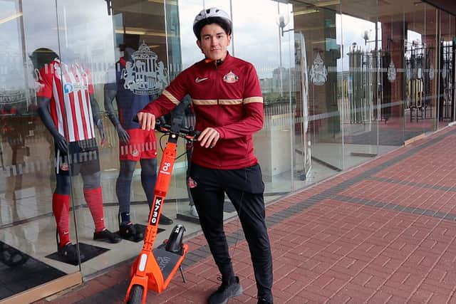 Sunderland AFC star Luke O'Nien with the new e-scooters being trialled in the city.