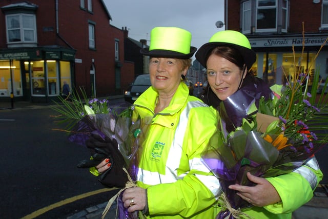 Valerie Laws and Suzanne Honeyford, who were responsible for the school crossing patrol in 2009, were presented with flowers but what was the occasion?