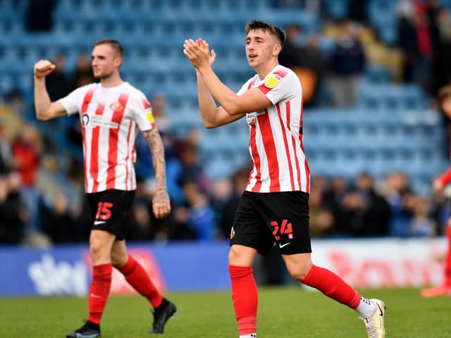 Dan Neil applauds the Sunderland fans at Gillingham.