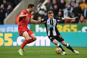 Chris Wood of Newcastle United battles for possession with Craig Cathcart of Watford FC during the Premier League match between Newcastle United and Watford at St. James Park on January 15, 2022 in Newcastle upon Tyne, England. (Photo by Stu Forster/Getty Images)