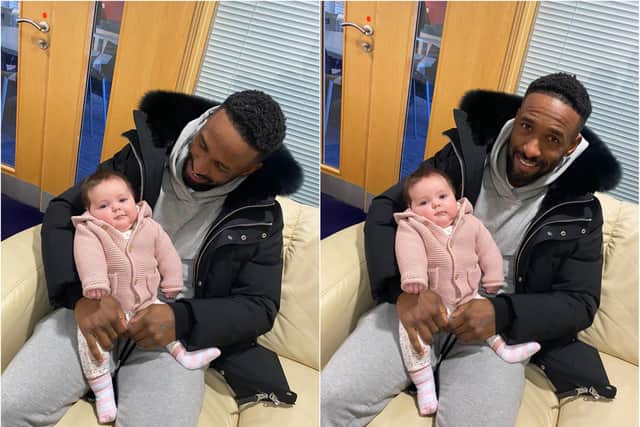 Baby Gracie had cuddles with Jermain Defoe ahead of his return to Sunderland AFC.