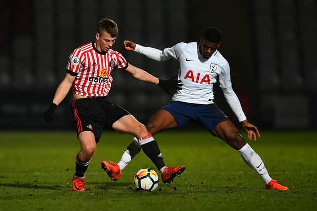 STEVENAGE, ENGLAND - DECEMBER 19:  Timothy Eyoma of Tottenham Hotspur battles for the ball with Andrew Nelson of Sunderland during the Premier League Two match between Tottenham Hotspur and Sunderland at The Lamex Stadium on December 19, 2017 in Stevenage, England. (Photo by Dan Mullan/Getty Images)