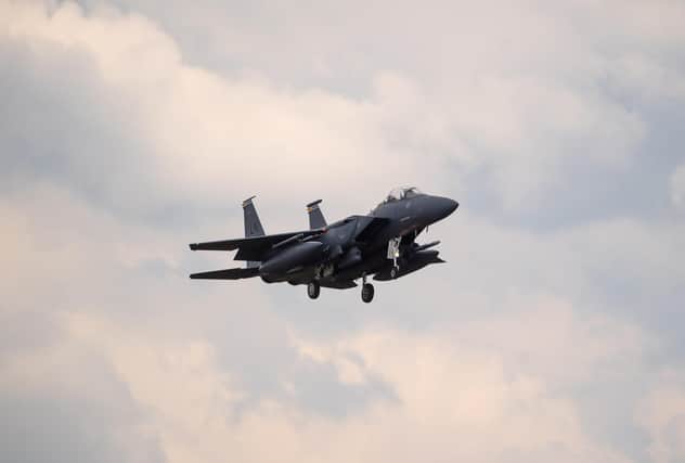 An F15 fighter jet landing at RAF Lakenheath, Suffolk, after an American fighter jet crashed into the North Sea while on a training exercise off the north-east coast of England.
