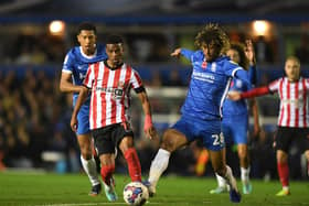 BIRMINGHAM, ENGLAND - NOVEMBER 11: Dion Sanderson of Birmingham City is challenges Amad Diallo of Sunderland during the Sky Bet Championship between Birmingham City and Sunderland at St Andrews (stadium) on November 11, 2022 in Birmingham, England. (Photo by Tony Marshall/Getty Images)