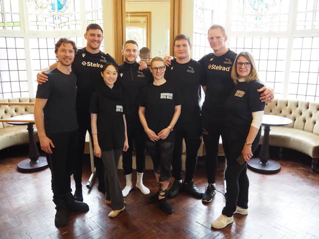 Members of Birmingham Royal Ballet with the rugby players
