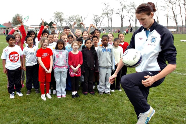 Jill shows her football skills at Richard Avenue Primary School in 2012.