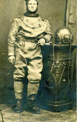 Harry Watts with medals and in diving suit. Pictures provided by Sunderland City Council