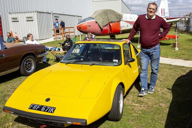 Keith Dobinson stands proudly next to his 1972 Clan Crusader. 