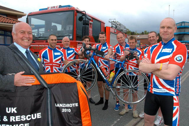 Fundraising firefighter Eddie Cooper, right, and his colleagues who were taking on an Ironman challenge on the volcanoes of Lanzarote in 2010.