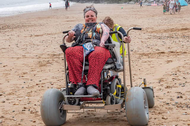An example of one of the specialist wheelchairs being used on Roker Beach as part of a trial day.