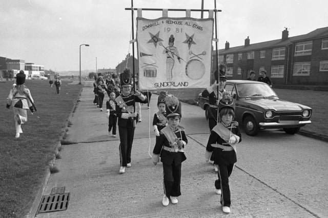 Downhill and Redhouse All Stars jazz band march through the streets 41 years ago.