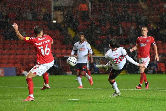 Kieran Lee of Bolton Wanderers scores against Charlton.