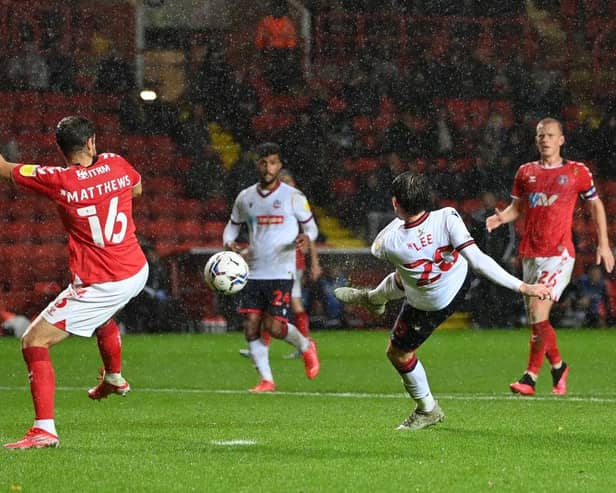 Kieran Lee of Bolton Wanderers scores against Charlton.