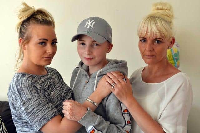 Josie King pictured with her sister Jessica and mum Donna Doneathy.