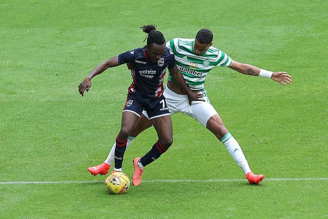 GLASGOW, SCOTLAND - JULY 26: Christopher Jullien of Celtic vies with Regan Charles-Cook of Ross County during the pre season friendly match between Celtic and Ross County at Celtic Park on July 26, 2020 in Glasgow, Scotland. (Photo by Ian MacNicol/Getty Images)