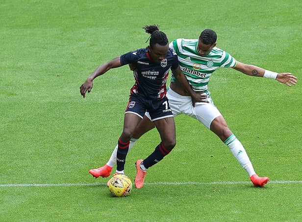 GLASGOW, SCOTLAND - JULY 26: Christopher Jullien of Celtic vies with Regan Charles-Cook of Ross County during the pre season friendly match between Celtic and Ross County at Celtic Park on July 26, 2020 in Glasgow, Scotland. (Photo by Ian MacNicol/Getty Images)