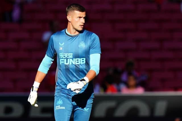 Karl Darlow of Newcastle United FC in action during the warm up before the start of the Eusebio Cup match between SL Benfica and Newcastle United at Estadio da Luz on July 26, 2022 in Lisbon, Portugal. (Photo by Gualter Fatia/Getty Images)