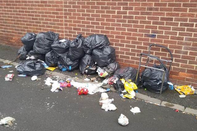 Bags of rubbish were also among the waste left in the lane.