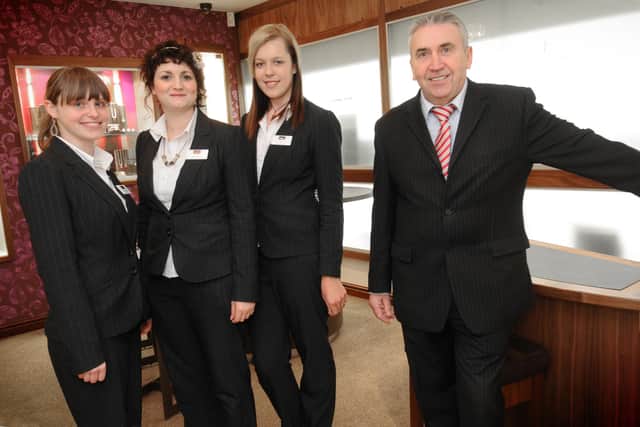 Harry Snr with staff Rachel Bewick, Stacey Craig, and Dela Bute