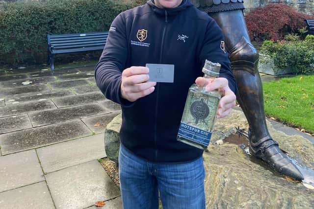 Andy Petherick, chief executive of Pilgrim Spirit Company which makes Hotspur Gin, by the Harry Hotpsur statue in Alnwick.