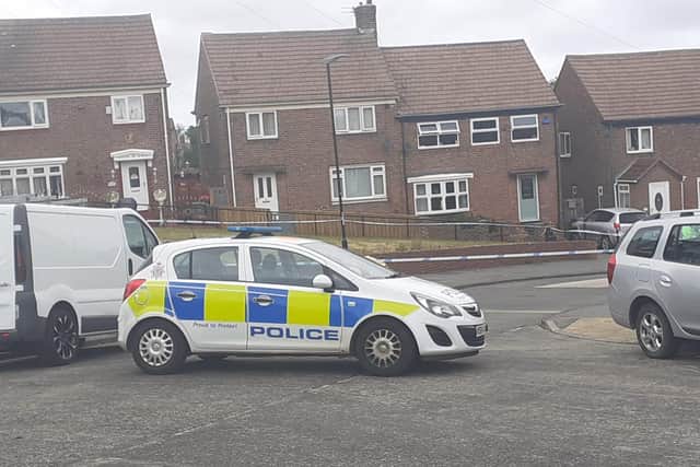 A police cordon is in place in Aintree Road.