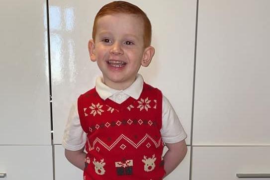 Doesn't he look smart! Ellis Brooke is the perfect gent for Christmas Jumper Day.