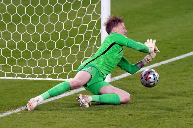 Jordan Pickford saves from Italy's Andrea Belotti during last night's penalty shoot out