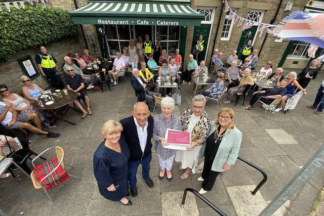 Fran and Peter Hopper and members of South Tyneside Council celebrating 50 years of their cafe in 2022.