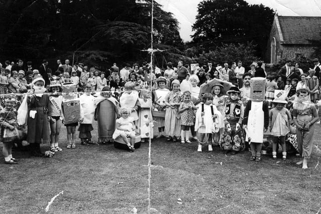 Sent in by Terry Trace of Copnor we see a summer fete held in St Thomas's Church, Bedhampton in 1964.  Terry can be seen fifth from the left. Are you in the photo?