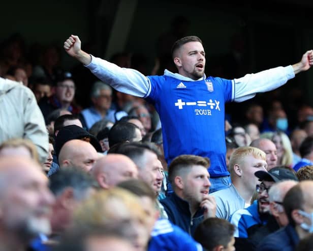 An Ipswich Town supporter shows his support. (Photo by Ashley Allen/Getty Images)