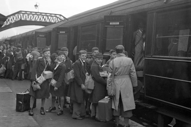 More evacuees leaving the station in 1939.