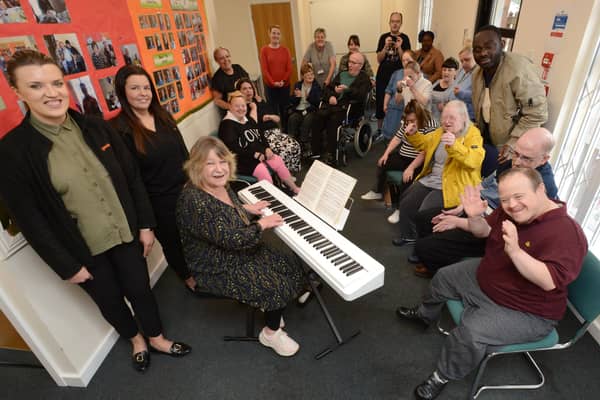 From left: Chloe Rudkin of Gentoo and Gentoo Tenant Voice admin Sheryl Robinson, with members of Pennywell Neighbourhood Centre singing group.