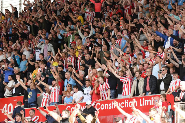 Sunderland fans enjoy themselves in the away end at Stoke City
