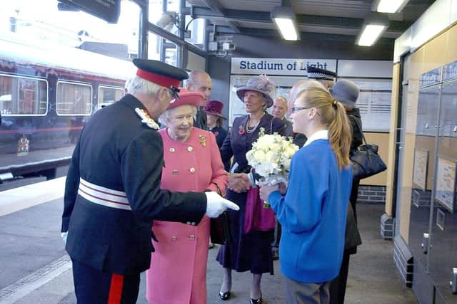 Lois pictured as she met the Queen in 2009.