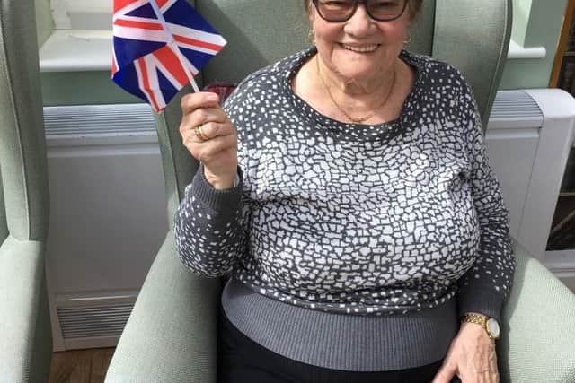 A patriotic care home residents flies the flag.