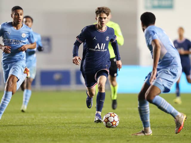 MANCHESTER, ENGLAND - NOVEMBER 24: Edouard Michut of Paris Saint-Germain runs with the ball during the UEFA Youth League match between Manchester City and Paris Saint-Germain at Manchester City Football Academy on November 24, 2021 in Manchester, England. (Photo by Charlotte Tattersall/Getty Images)