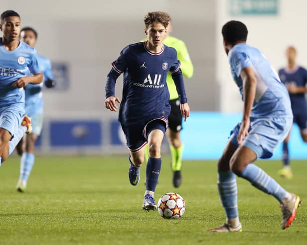 MANCHESTER, ENGLAND - NOVEMBER 24: Edouard Michut of Paris Saint-Germain runs with the ball during the UEFA Youth League match between Manchester City and Paris Saint-Germain at Manchester City Football Academy on November 24, 2021 in Manchester, England. (Photo by Charlotte Tattersall/Getty Images)