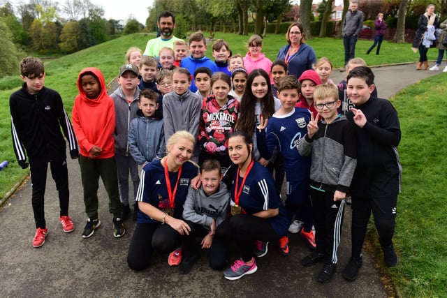 London marathon runners Kay Sampson (kneeling front left) and Karen Cook Wilson (kneeling front right) were pictured with pupils from Barnes Junior School taking part in a mile long charity run in Barnes Park, in aid of St. Johns Ambulance 6 years ago.