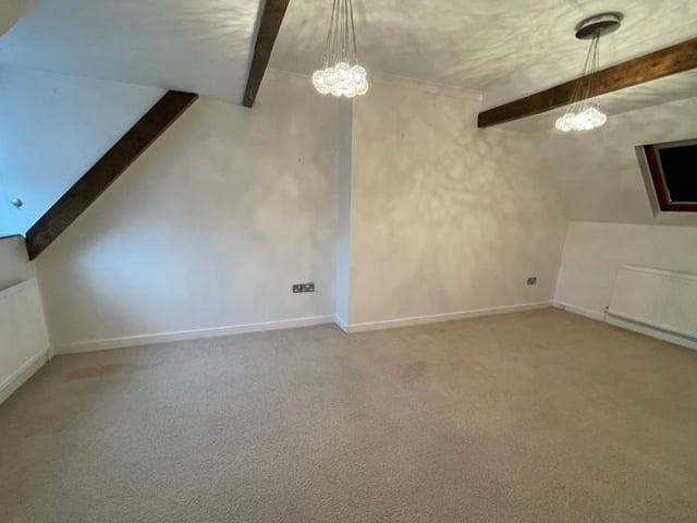 Here is the third and smallest of the bedrooms. The windows provide plenty of light and the central heating radiators plenty of warmth.