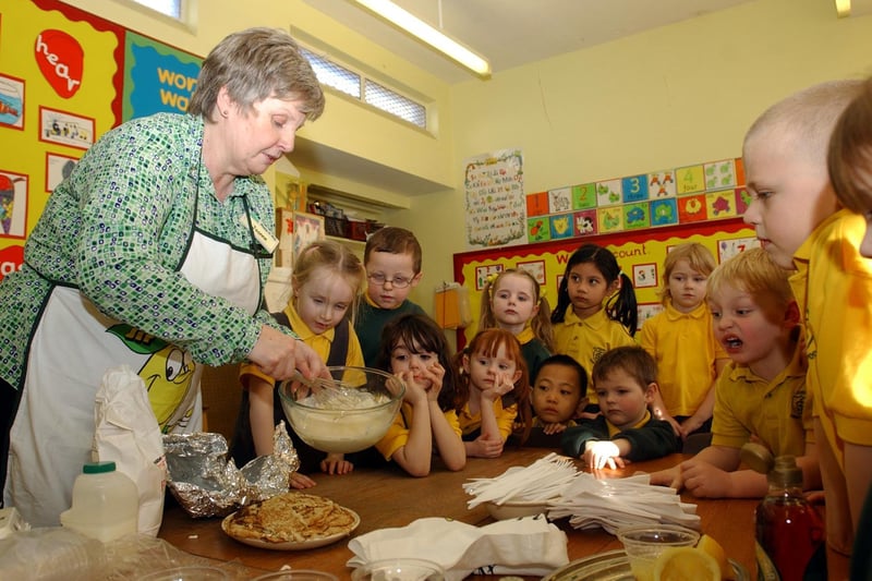 Back to 2004 and these children are showing great interest in the pancake-making session at St Joseph's RC Primary School. Remember this?