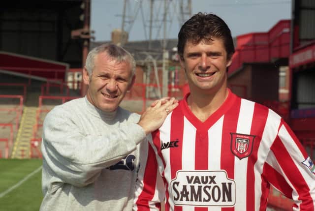 Peter Reid signed striker Niall Quinn in August 1996, shortly before Premier Passions began shooting.