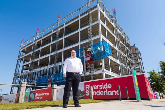 The new Sunderland Town Hall . part of The Riverside Development has topped out as it reached the highest point. Councillor Graeme Miller outisde the construction  site.