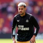 Bruno Guimaraes looks on during warm up prior to the Premier League match between Brentford FC and Newcastle United (Photo by Alex Pantling/Getty Images)